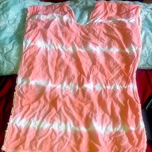 was a shirt but was cut and now a swimmers cover